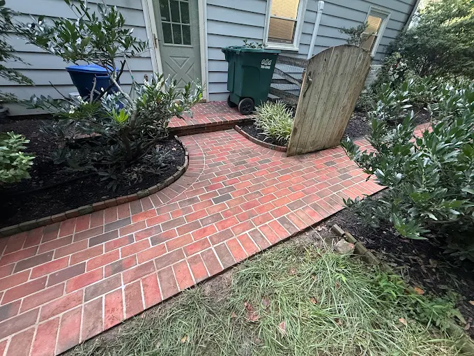 Brick pavers restored to original color after professional cleaning