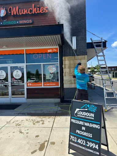 Owner of Loudoun Exterior Cleaning on a commercial cleaning job