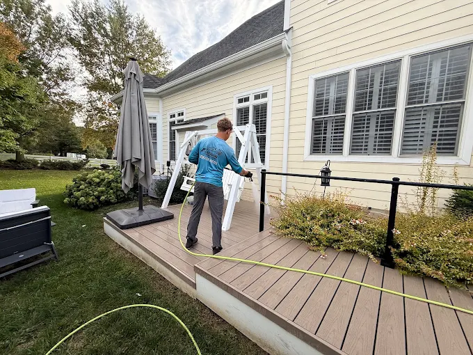 Deck being cleaned with low pressure by Loudoun Exterior Cleaning