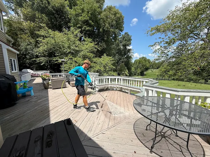 Loudoun Exterior Cleaning technician cleaning a deck in Loudoun County, VA